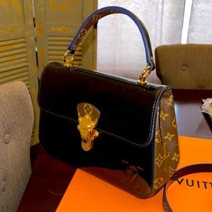 Brand new Louis Vuitton Noir Cherrywood PM